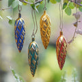 Four Handcrafted Gold Tone Albesia Wood Ornaments from Bali 'Golden Cones'